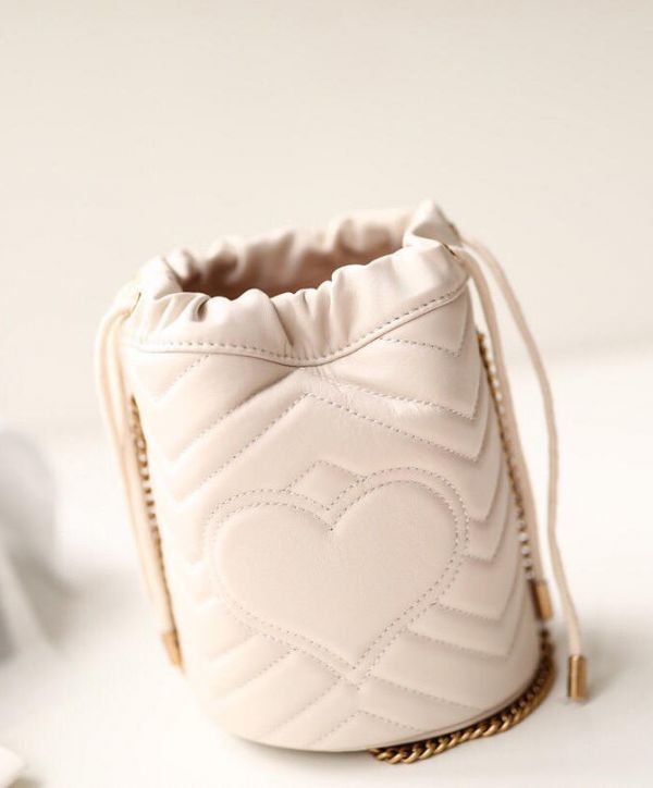 Gucci GG Marmont Mini White Matelasse Quilted Leather Brass Interlocking GG Design Drawstring Closure Women Chian Buckle 575163 DTDRT 9022