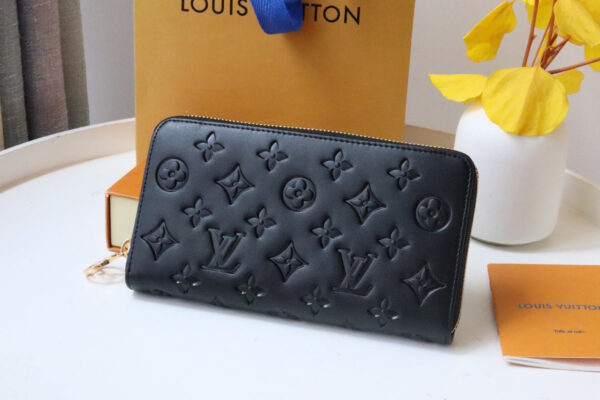 13349352745278392_021ac6d8-9cb8-421d-8a22-f02cf65156ea ZIPPY WALLET 19 BLACK EMBOSSED LAMBSKIN