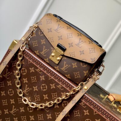 20230825_i1692931188_6433_0_jpg POCHETTE MÉTIS EAST WEST 21.5 IN BROWN MONOGRAM COATED CANVAS AND CALFSKIN