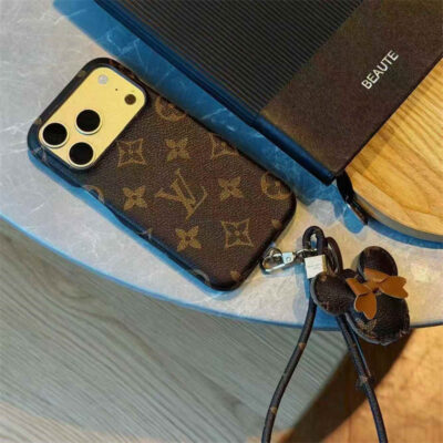 2026-05-11_085838_555 Luxury Monogram Case with Bow Charm & Wrist Lanyard for iPhone 12-18 Pro & Pro Max