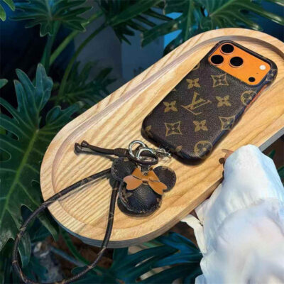 2026-05-11_085855_970 Luxury Monogram Case with Bow Charm & Wrist Lanyard for iPhone 12-18 Pro & Pro Max