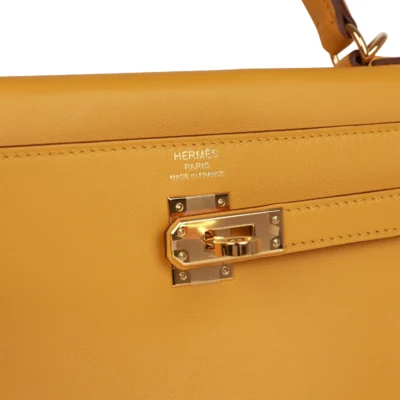 3c83080adf40600ac5deceaf8b98a461 Hermès Kelly Retourne 25 Jaune Ambre Swift Gold Hardware