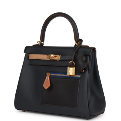 44d6d59c5f1bc5943b9d407b190146d7 Hermès Colormatic Kelly Retourne 25 Caban, Black and Chai Swift Gold Hardware