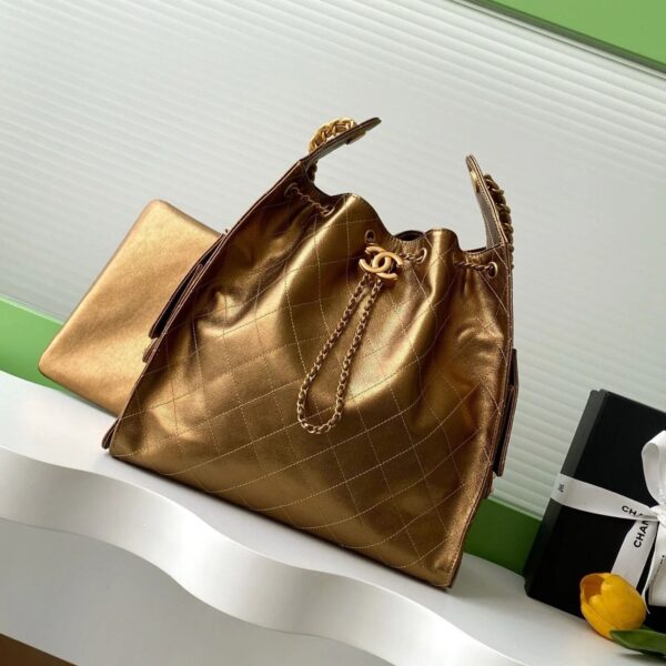 Image_20250623112123 GABRIELLE BUCKET BAG IN METALLIC GOLD LAMBSKIN