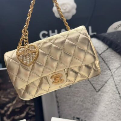 CC CLASSIC FLAP BAG 13 IN GOLD LAMBSKIN WITH PEARL HEART CHARM