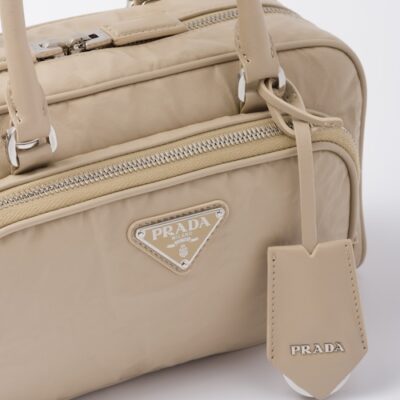 db3c1ca3df6377bf60a7e399c06d9178 Prada Antique nappa leather multi-pocket top-handle bag - Desert Beige