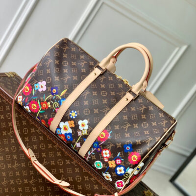 imgHD_4828b284_20250326_cmp_i1742973601104_2171_0_2_jpg KEEPALL BANDOULIÈRE FLORAL 45 IN BROWN MONOGRAM COATED CANVAS