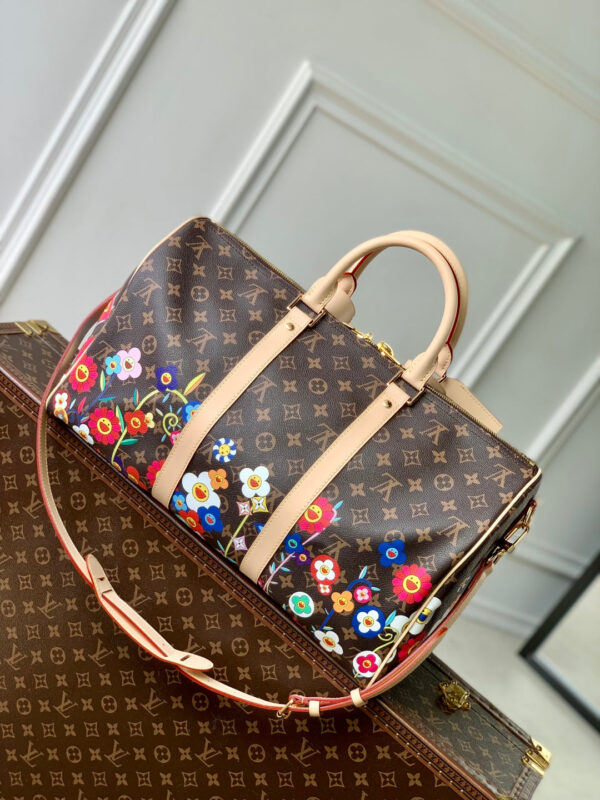imgHD_4828b284_20250326_cmp_i1742973601104_2171_0_2_jpg KEEPALL BANDOULIÈRE FLORAL 45 IN BROWN MONOGRAM COATED CANVAS