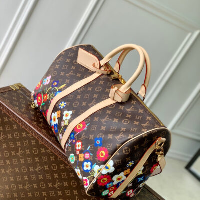imgHD_4828b284_20250326_cmp_i1742973609363_7080_0_1_jpg KEEPALL BANDOULIÈRE FLORAL 45 IN BROWN MONOGRAM COATED CANVAS