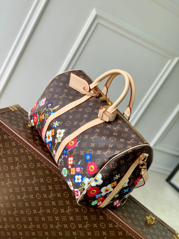 imgHD_4828b284_20250326_cmp_i1742973609363_7080_0_1_jpg KEEPALL BANDOULIÈRE FLORAL 45 IN BROWN MONOGRAM COATED CANVAS