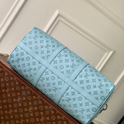 KEEPALL BANDOULIÈRE 50 IN SKY BLUE MONOGRAM SHADOW EMBOSSED CALFSKIN
