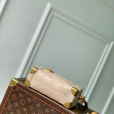 SIDE TRUNK 19 IN BEIGE MONOGRAM BOLD CALFSKIN GOLD HARDWARE
