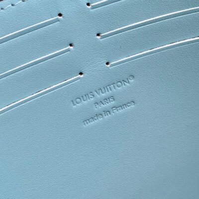POCHETTE VOYAGE 26 IN SKY BLUE MONOGRAM ECLIPSE CALFSKIN
