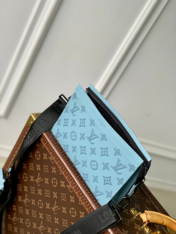 GASTON WEARABLE WALLET 22 IN SKY BLUE MONOGRAM SHADOW CALFSKIN EMBOSSED LOGO
