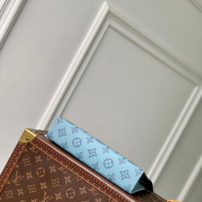 GASTON WEARABLE WALLET 22 IN SKY BLUE MONOGRAM SHADOW CALFSKIN EMBOSSED LOGO