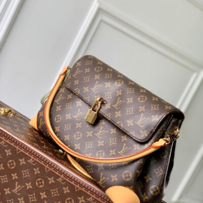 imgHD_4828b284_20250514_cmp_i1747209790972_9015_0_1_jpg HIDE AWAY MM 36 IN BROWN MONOGRAM COATED CANVAS AND CALFSKIN