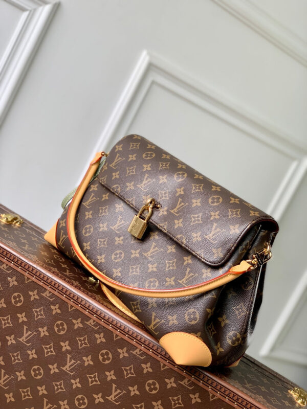 imgHD_4828b284_20250514_cmp_i1747209790972_9015_0_1_jpg HIDE AWAY MM 36 IN BROWN MONOGRAM COATED CANVAS AND CALFSKIN
