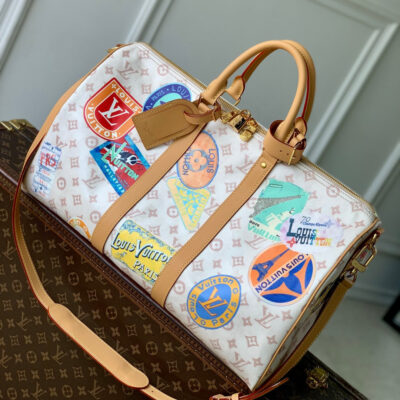 KEEPALL BANDOULIÈRE 45 IN WHITE MONOGRAM DUNE CANVAS AND CALFSKIN