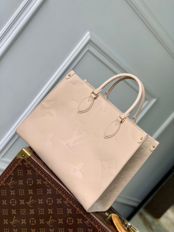 ONTHEGO MM 35 IN  BLUSH PINK MONOGRAM CALFSKIN