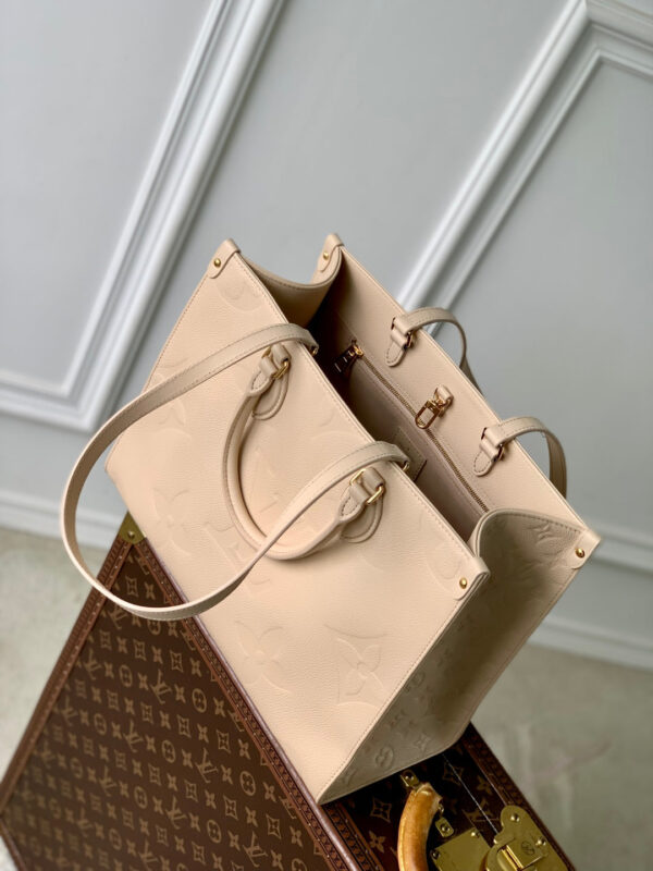 ONTHEGO MM 35 IN  BLUSH PINK MONOGRAM CALFSKIN