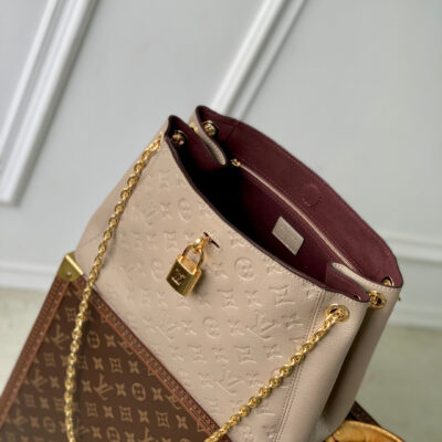 imgHD_4828b284_20250523_cmp_i1747987471167_8649_0_8_jpg ANYTIME PM 34 IN ASH BROWN MONOGRAM EMPREINTE CALFSKIN
