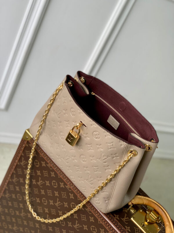 imgHD_4828b284_20250523_cmp_i1747987471167_8649_0_8_jpg ANYTIME PM 34 IN ASH BROWN MONOGRAM EMPREINTE CALFSKIN