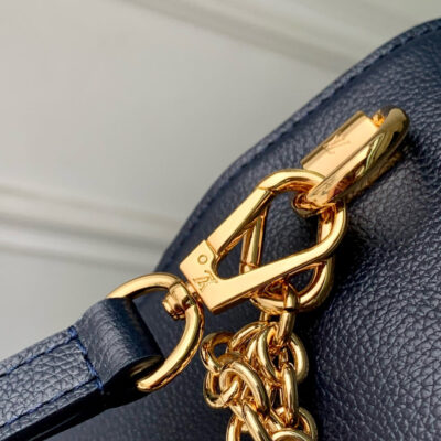 imgHD_4828b284_20250531_cmp_i1748676856604_5264_0_5_jpg TWIST SLIM 19 IN NAVY BLUE TAURILLON CALFSKIN GOLD HARDWARE