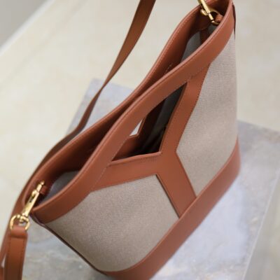 YSL 25S Y SMALL BUCKET 29 IN DESERT DUST AND BRICK CANVAS GOLD HARDWARE
