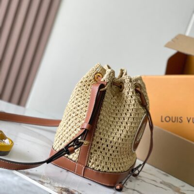 img_1578ca1d_20240730_a1722277874530_8782_jpg NOÉ PURSE 24 IN BEIGE CROCHETED RAFFIA AND BROWN CALFSKIN TRIM
