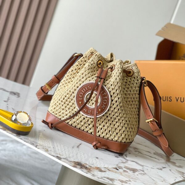 img_1578ca1d_20240730_a1722277874574_2404_jpg NOÉ PURSE 24 IN BEIGE CROCHETED RAFFIA AND BROWN CALFSKIN TRIM