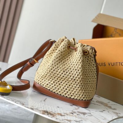 img_1578ca1d_20240730_a1722277874890_7665_jpg NOÉ PURSE 24 IN BEIGE CROCHETED RAFFIA AND BROWN CALFSKIN TRIM