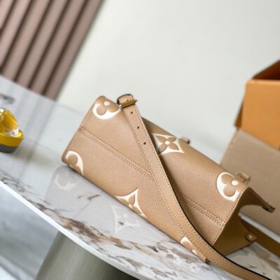 img_1578ca1d_20241019_a1729275770049_6532_jpg ONTHEGO PM 25 IN MILK TEA MONOGRAM IMPREINTE LEATHER