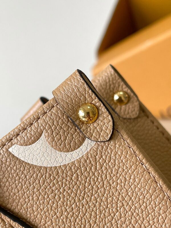 img_1578ca1d_20241019_a1729275770246_4708_jpg ONTHEGO PM 25 IN MILK TEA MONOGRAM IMPREINTE LEATHER