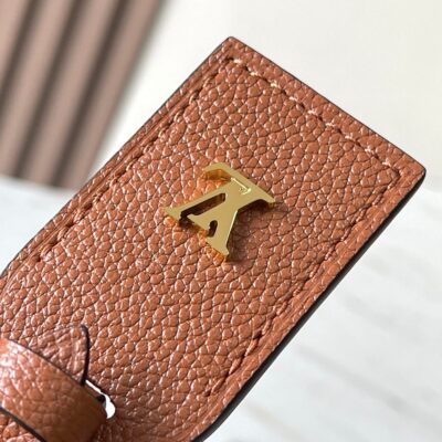 CARRYALL PM 29 IN COGNAC MONOGRAM EMPREINTE LEATHER GOLD LOGO