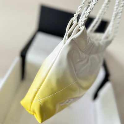 img_19e73950_20240525_i1716646909_2739_3_jpg CC HOBO MINI 20CM YELLOW WHITE LAMBSKIN