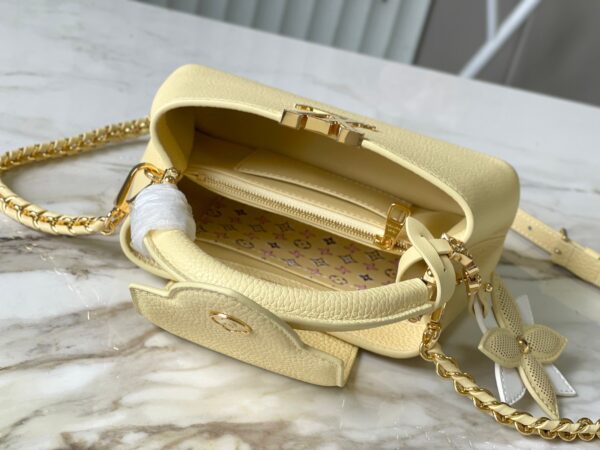 img_460b6f34_20241002_a1727828726834_8775_jpg CAPUCINES EAST-WEST MINI 22 IN BANANA YELLOW TAURILLON GOLD HARDWARE