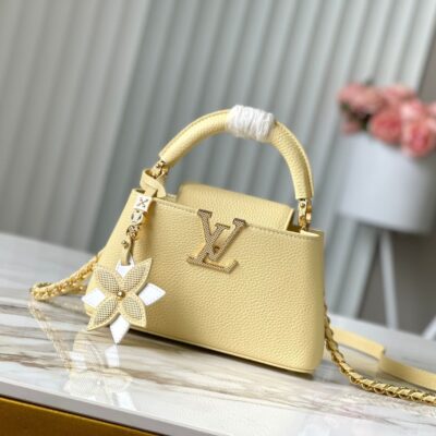 img_460b6f34_20241002_a1727828726849_0328_jpg CAPUCINES EAST-WEST MINI 22 IN BANANA YELLOW TAURILLON GOLD HARDWARE