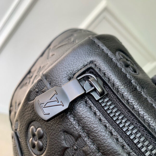 img_4828b284_20241127_i1732696329_6148_3_jpg GETAWAY BACKPACK 50 IN BLACK MONOGRAM ECLIPSE CANVAS AND CALFSKIN EMBOSSED LOGO