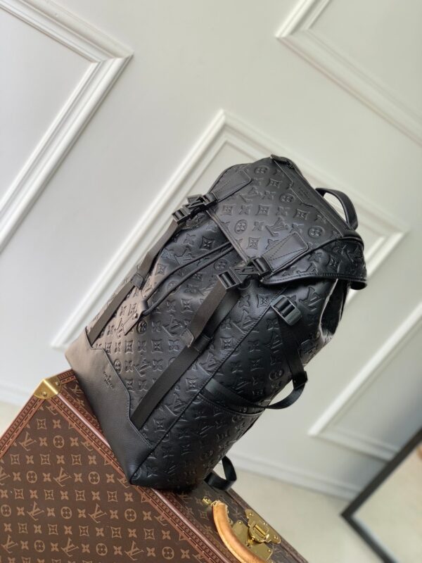 img_4828b284_20241127_i1732696329_6797_5_jpg GETAWAY BACKPACK 50 IN BLACK MONOGRAM ECLIPSE CANVAS AND CALFSKIN EMBOSSED LOGO