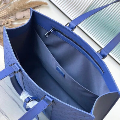 SAC PLAT 24H 41 IN SAPPHIRE BLUE MONOGRAM EMBOSSED TAURILLON