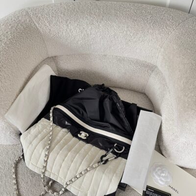 CHANEL 26S DRAWSTRING BACKPACK 44 IN BLACK AND WHITE NYLON GOLD HARDWARE