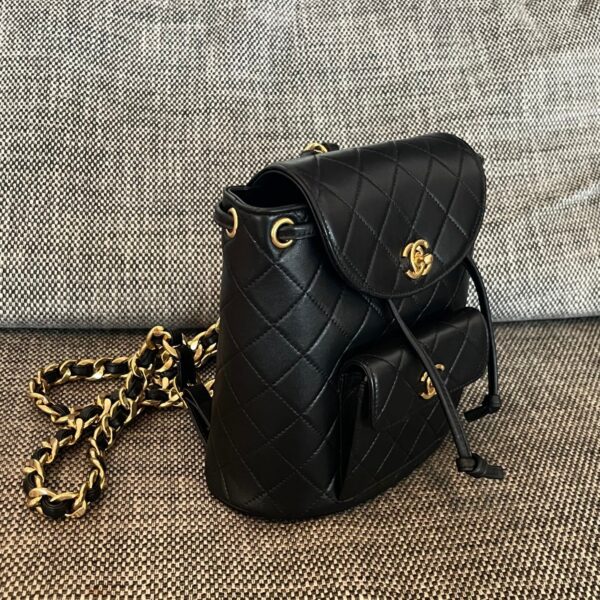 CHANEL 26S BACKPACK WITH FRONT POCKET 21 IN BLACK QUILTED LAMBSKIN GOLD HARDWARE