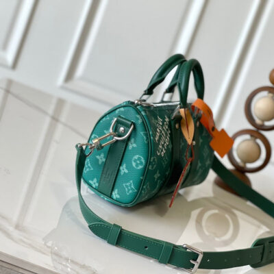 img_8629616d_20241002_i1727863255_7528_0_jpg KEEPALL BANDOULIÈRE 25 IN GREEN MONOGRAM HERITAGE CANVAS