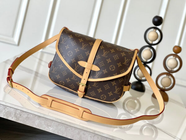 SAUMUR BB 28 IN BROWN MONOGRAM CANVAS AND LEATHER TRIM GOLD HARDWARE