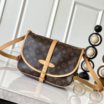 SAUMUR BB 28 IN BROWN MONOGRAM CANVAS AND LEATHER TRIM GOLD HARDWARE