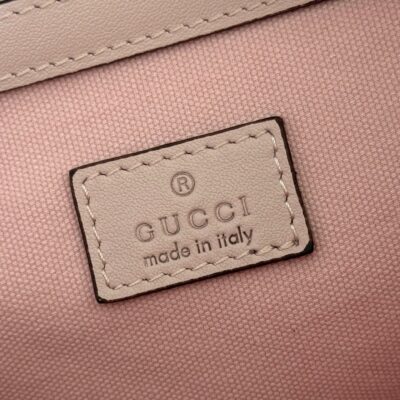GUCCI 26S GG EMBLEM BUCKET BAG 25 IN LIGHT PINK COATED FABRIC