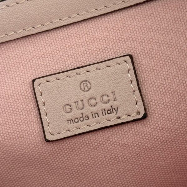 GUCCI 26S GG EMBLEM BUCKET BAG 25 IN LIGHT PINK COATED FABRIC