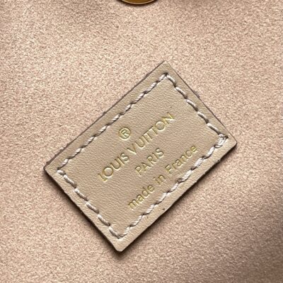 CRAFTY NEONOE 26 IN BROWN AND CREAM BICOLOR EMPREINTE CALFSKIN