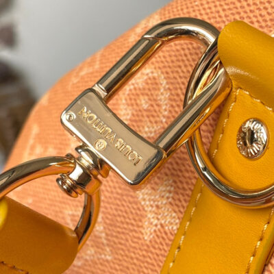 KEEPALL BANDOULIÈRE 55 IN ORANGE MONOGRAM HERITAGE CANVAS