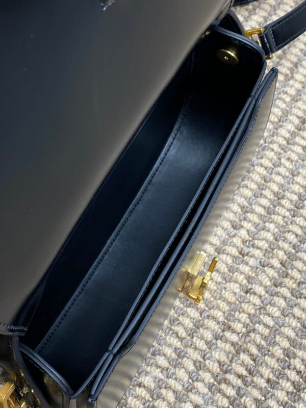 VOLTAIRE HALF-MOON SHOULDER BAG 24 IN BLACK CALFSKIN GOLD METALLIC